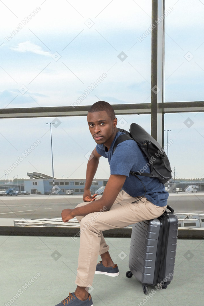 Man with suitcase in the airport