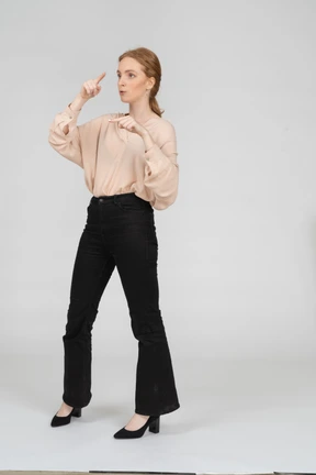 Woman in beautiful blouse standing
