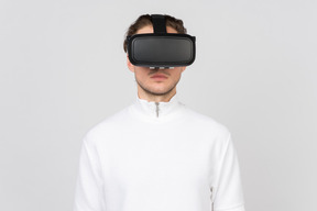 Young man in virtual reality headset