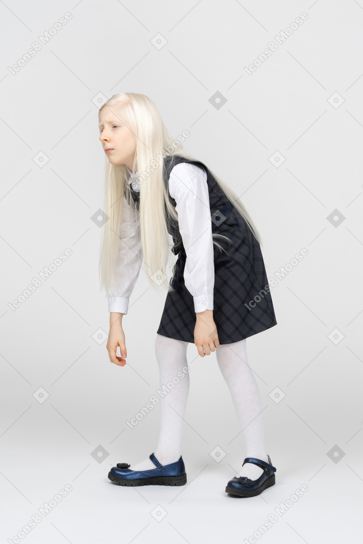 Schoolgirl slouching and looking tired