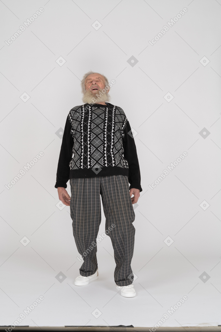 Elderly man bending back and looking up