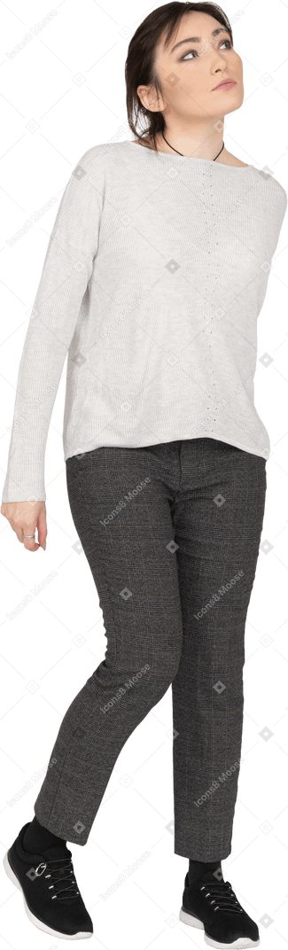 Young woman in casual clothing isolated over white background