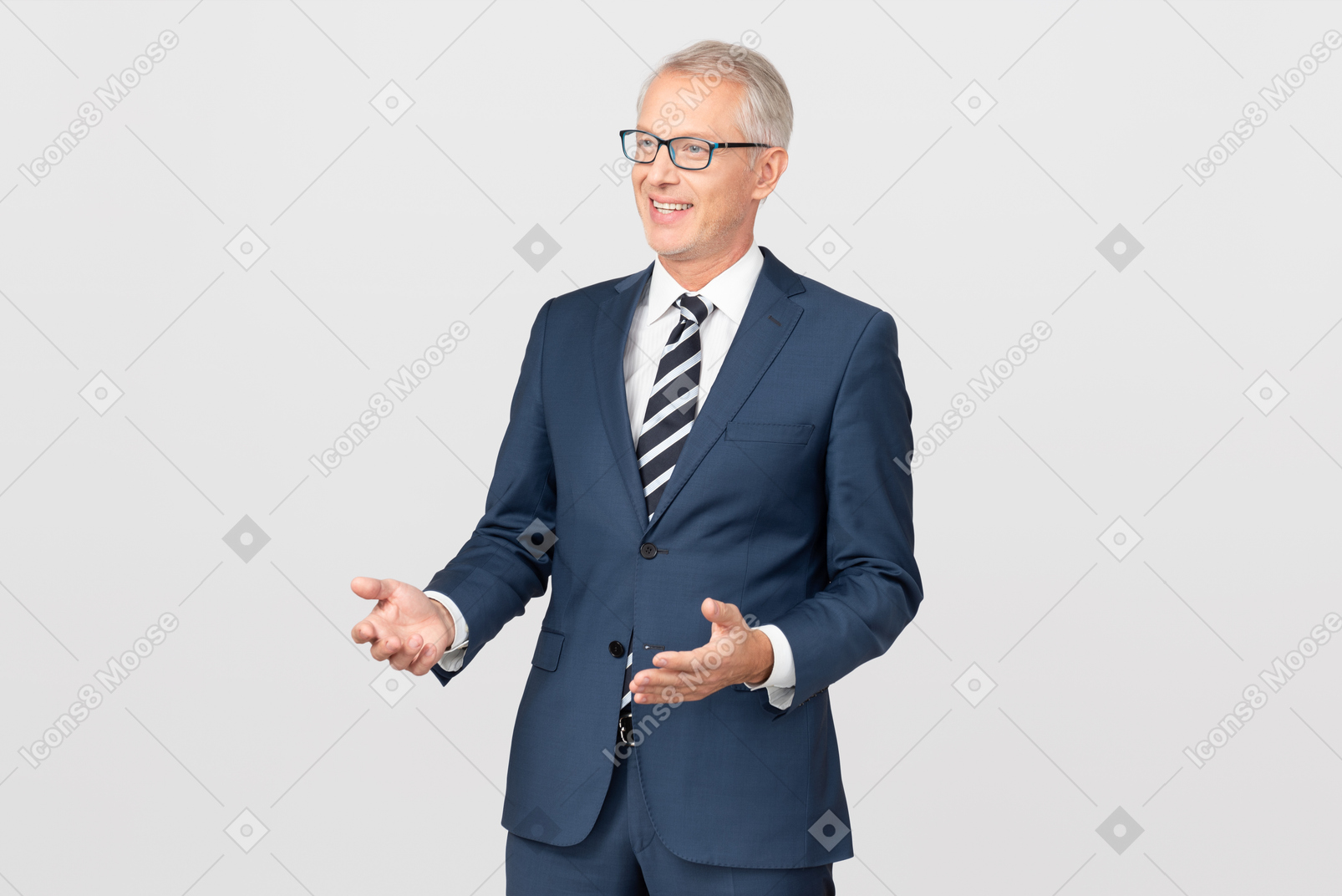 Smiling middle aged businessman standing with his hands spread