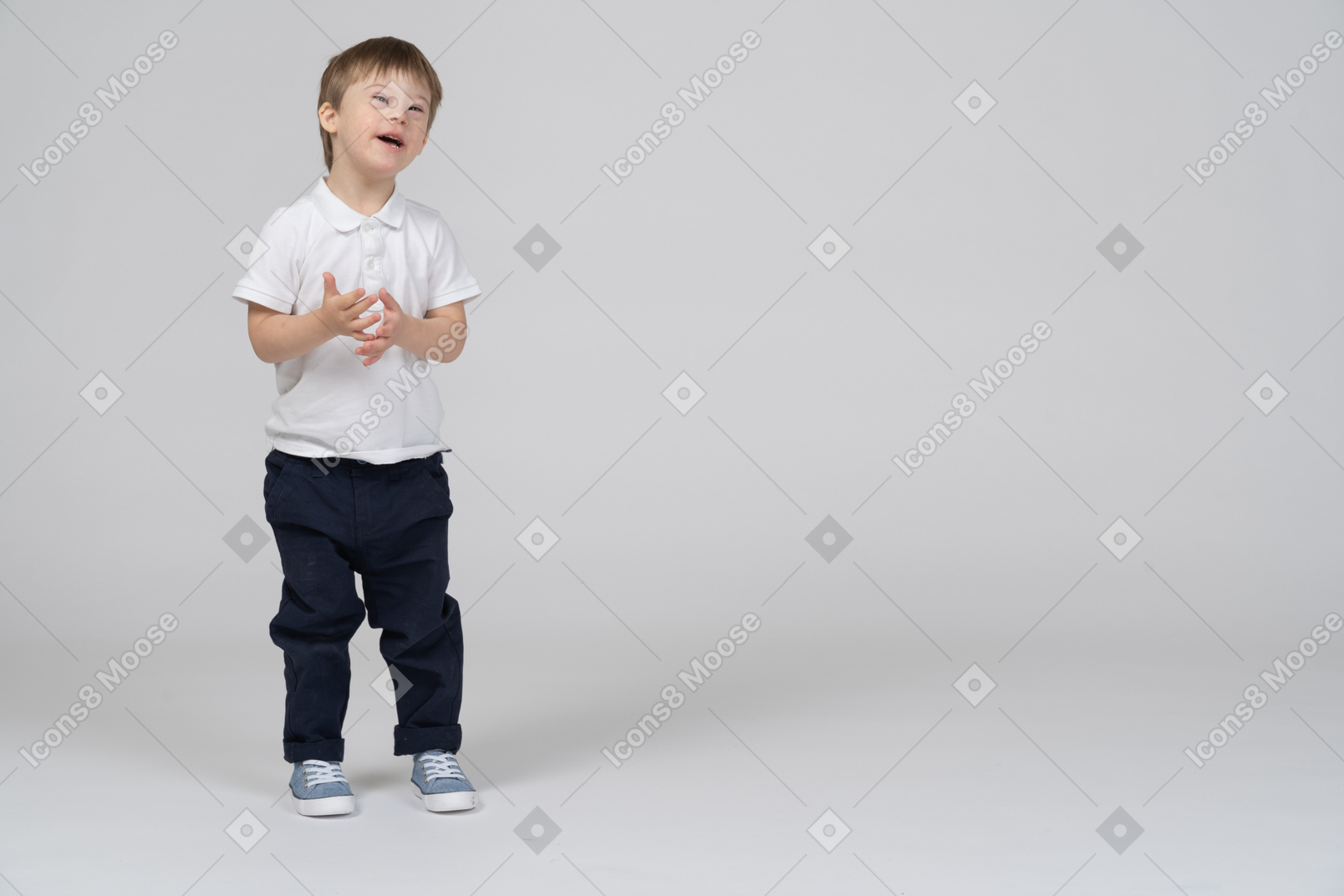Little boy in casual clothes standing