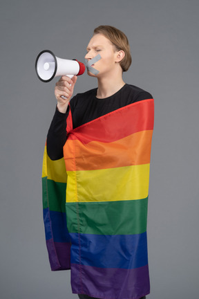 Lgbtq+ activist with their mouth taped shut