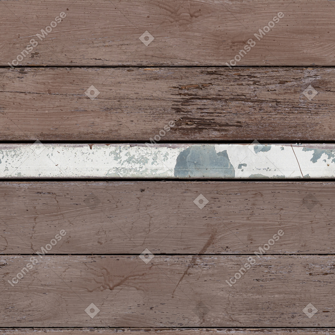 Planches en bois avec une poutre métallique