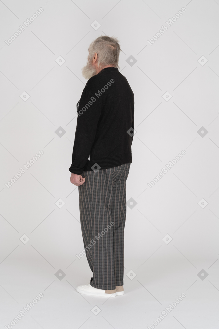 Rear view of old man looking straight