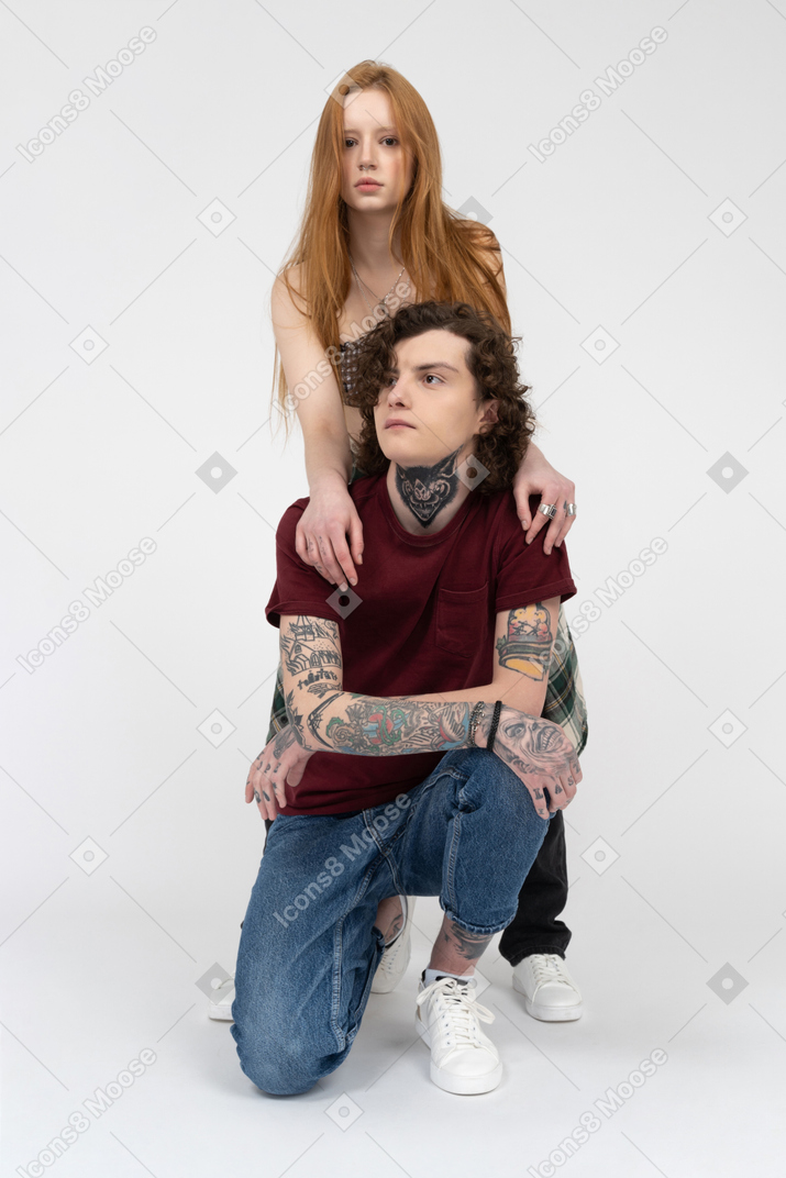 Full length portrait of teenagers posing together