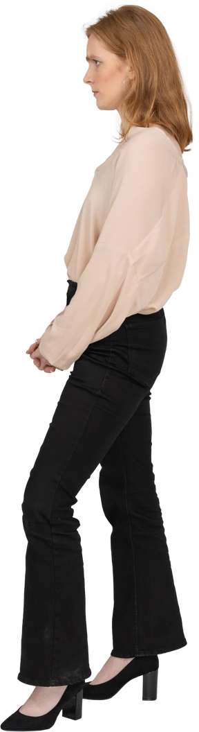 Woman in beautiful blouse standing