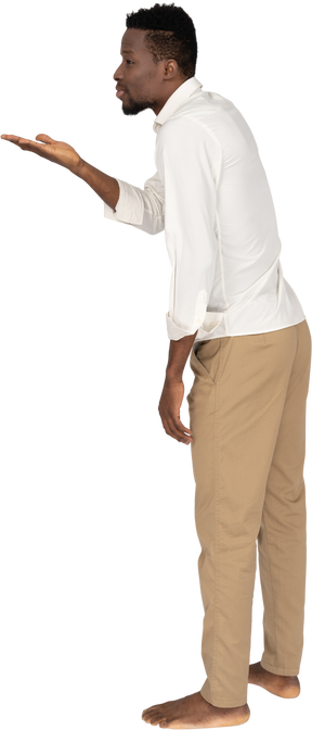 Man in white shirt standing