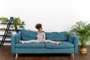 Cute girl on the sofa