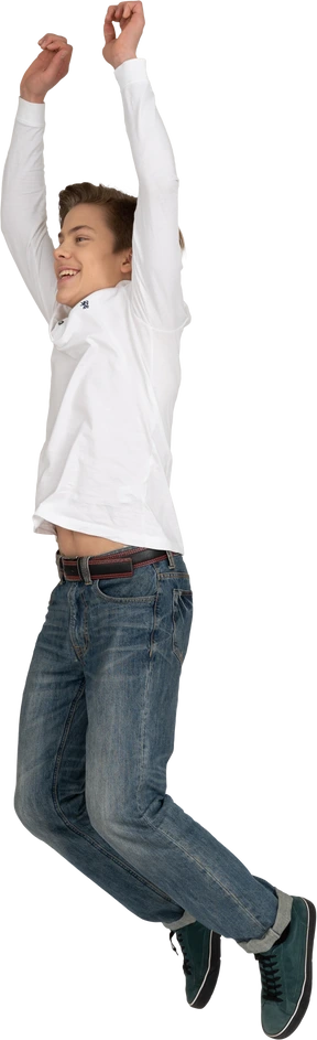 Young main in casual clothes jumping