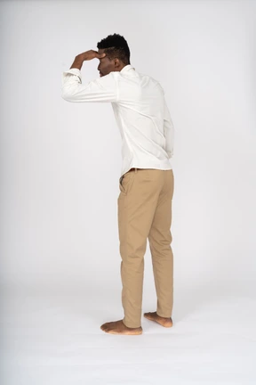 Man in white shirt standing