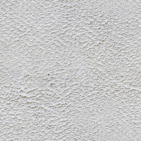 A close up of a white wall