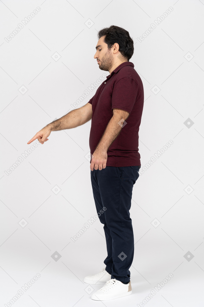 Man in casual clothes pointing his finger