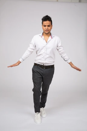 Man in white shirt standing