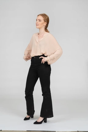 Woman in beautiful blouse standing