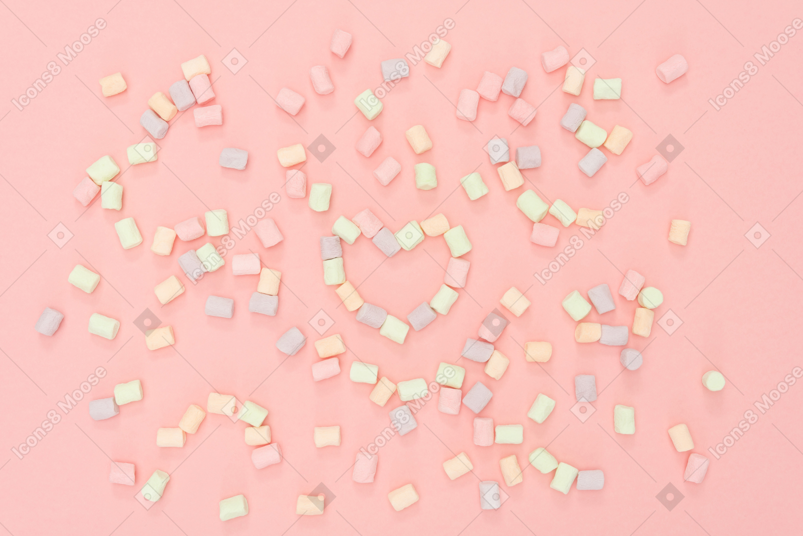 Colourful marshmallows arranged in the shape of heart
