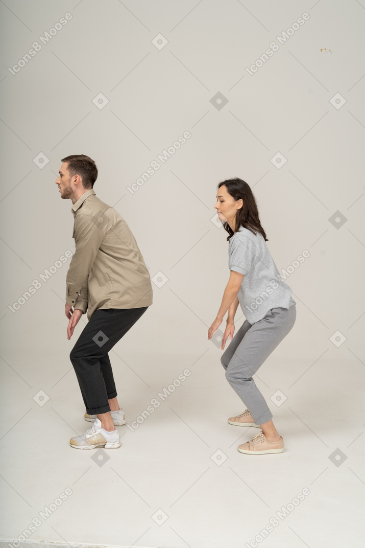Man and woman doing a dance move