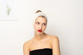 Portrait of a young woman with bandaged head