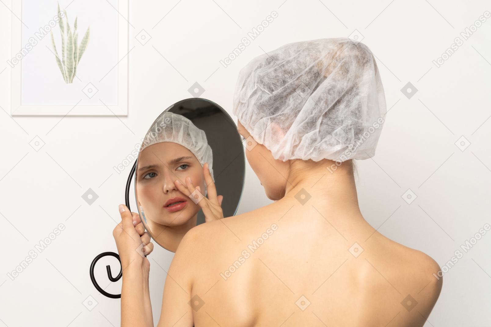 Disappointed woman looking at her reflection in the mirror