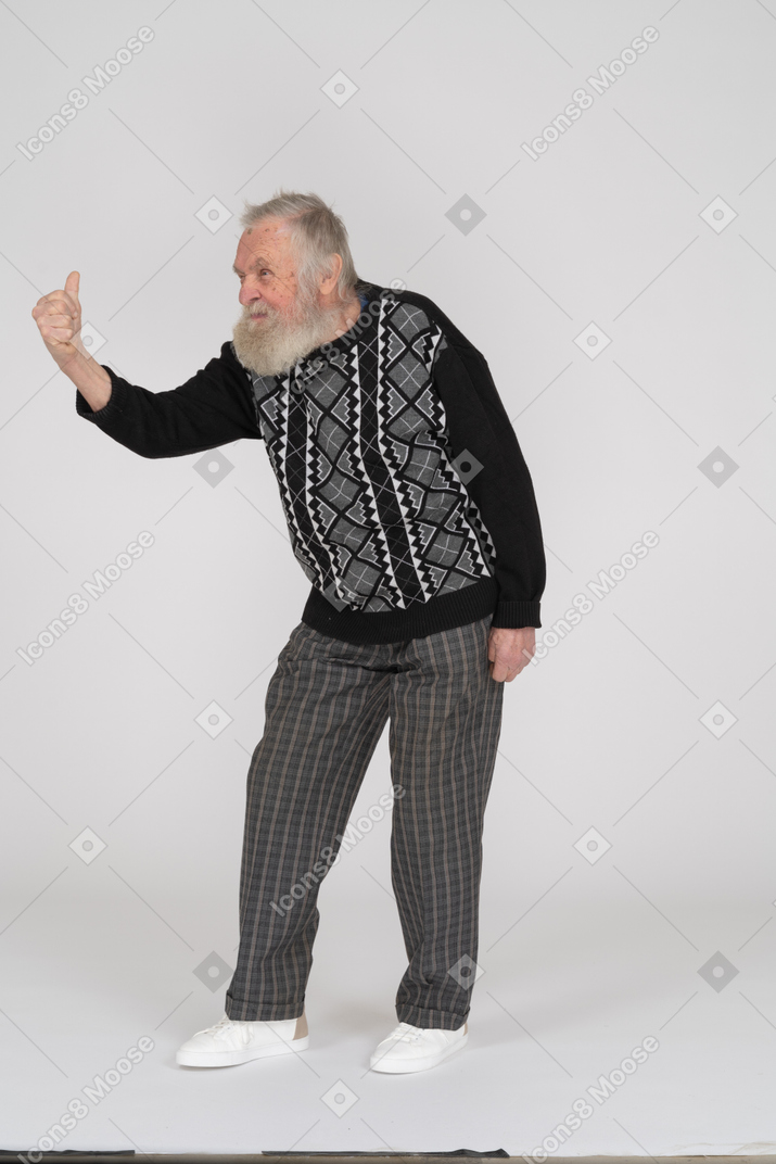 Old man showing thumbs up