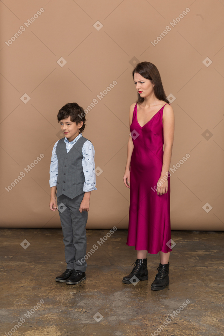Three quarter view of angry woman and boy