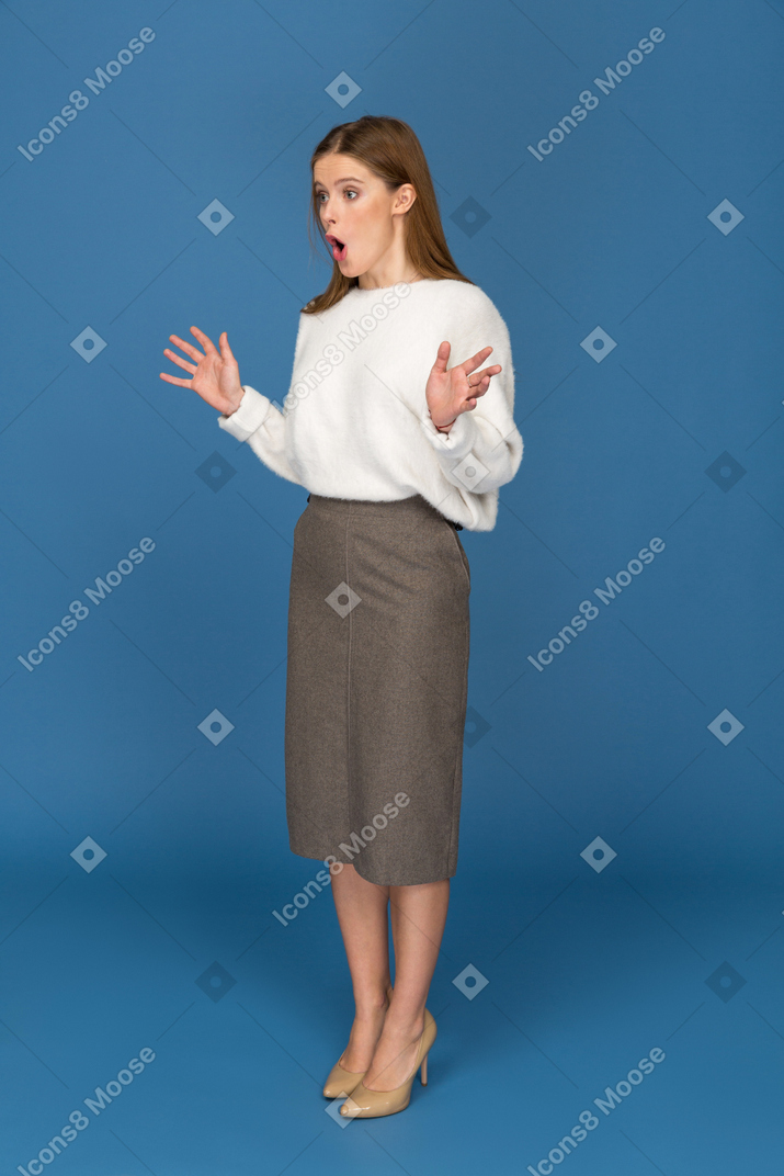 Young businesswoman being astonished