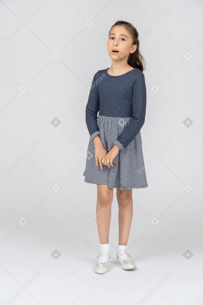 Front view of a girl trying to say something unsurely