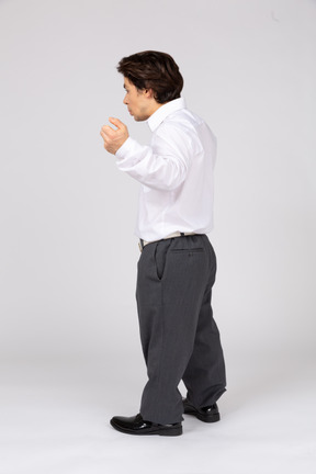 Man in white shirt gesturing