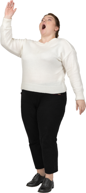 Front view of an impressed plus size woman in casual clothes