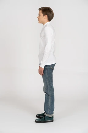 Young man in casual clothes standing