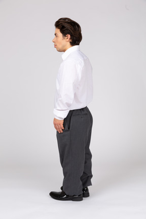 Side view of young man standing