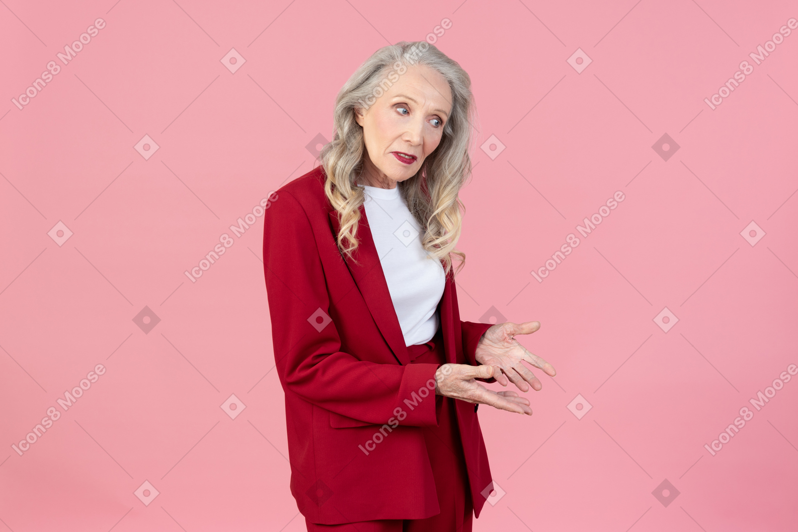 Old fashionable woman seems like not getting something