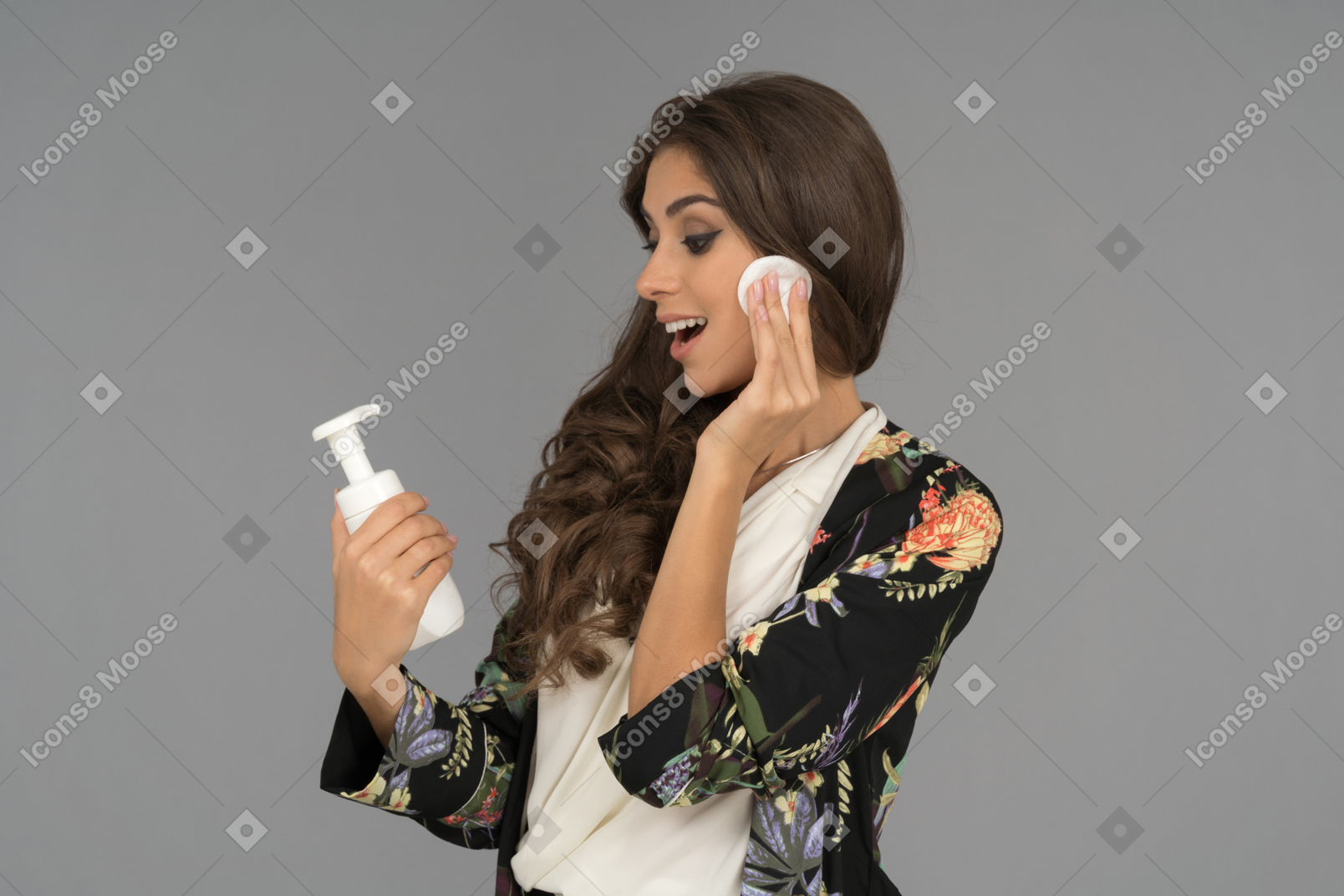 Pretty young woman surprised with a new beauty product