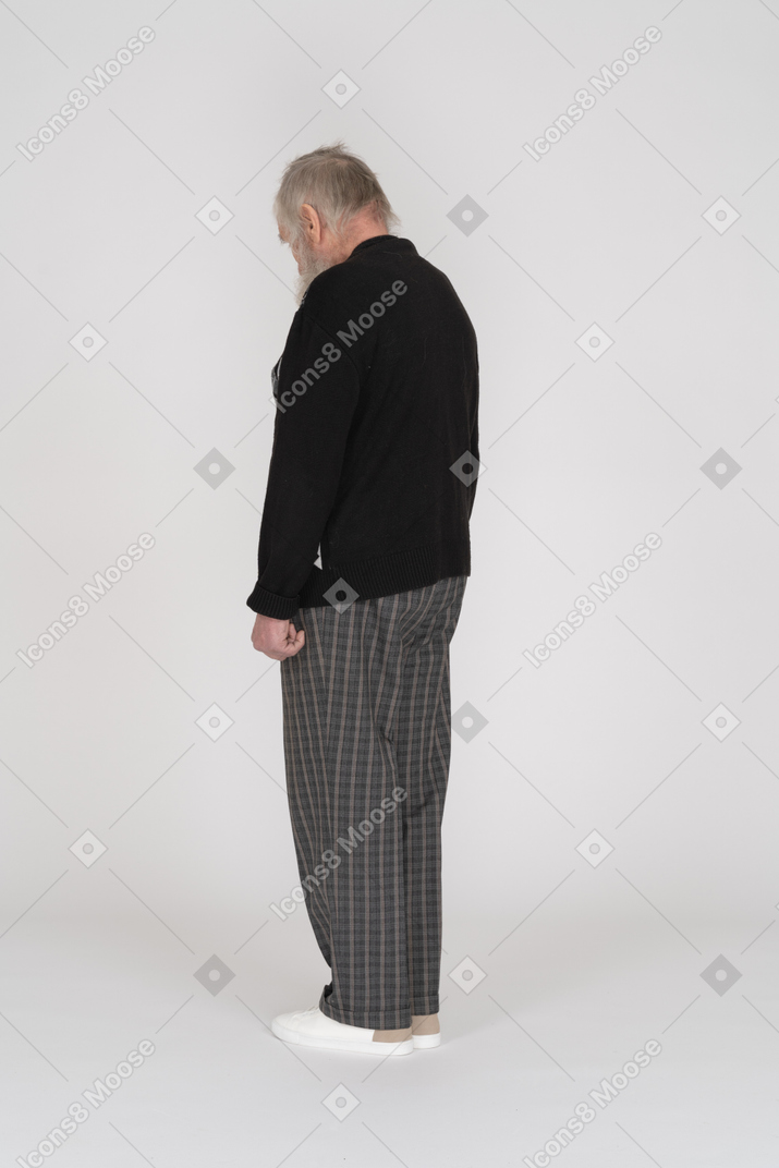 Rear view of old man tilted head down