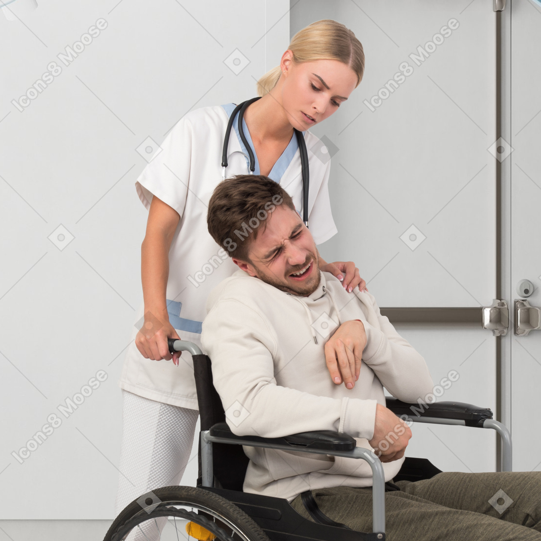 Doctor with patient in a wheelchair