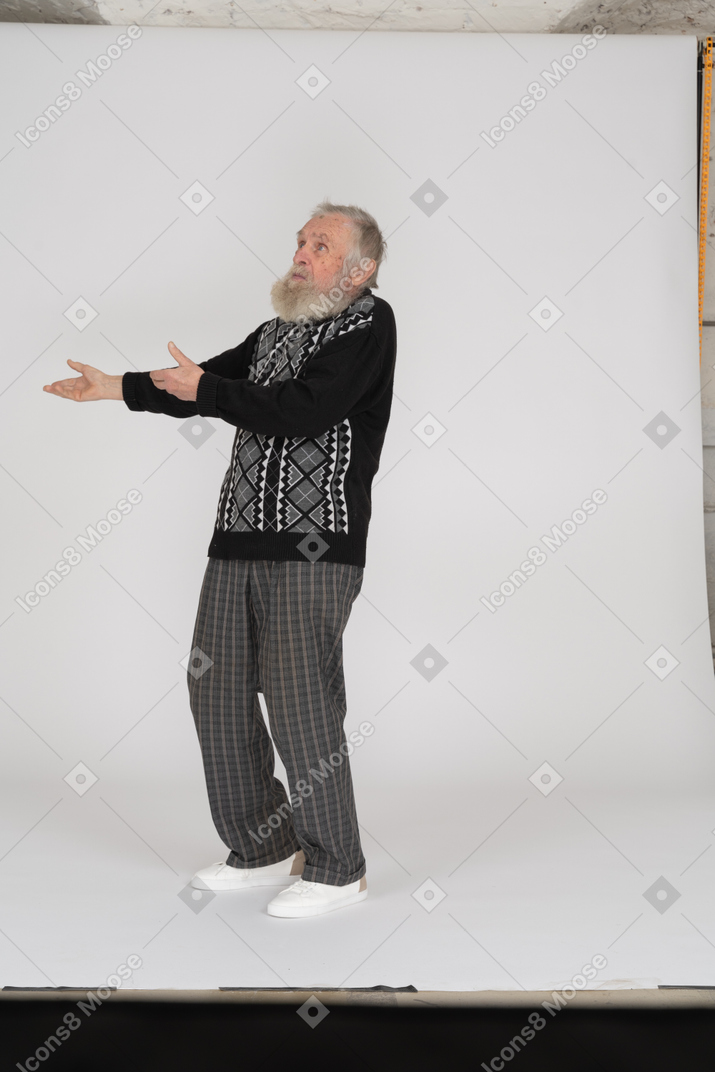 Old man complaining and gesturing