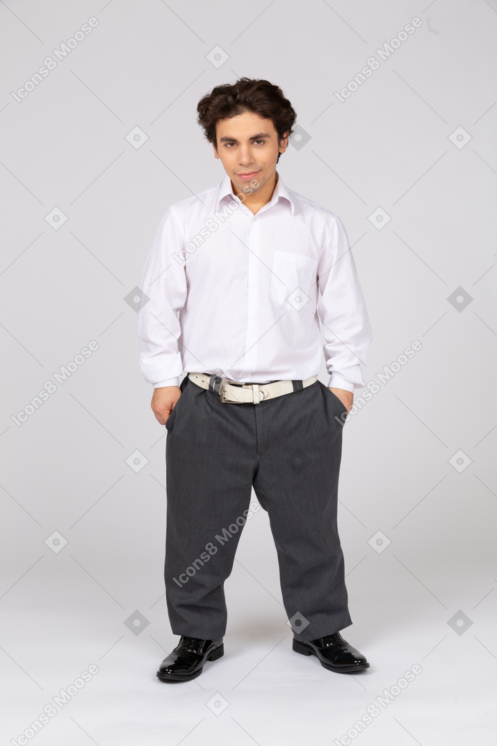Man with hands in pockets