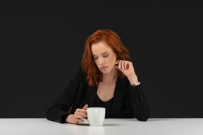 Cute girl drinking coffee