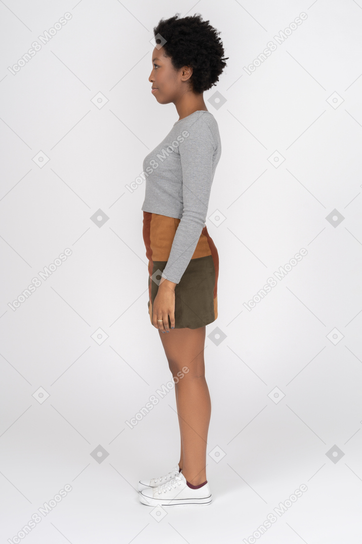 Cute african girl posing sideways