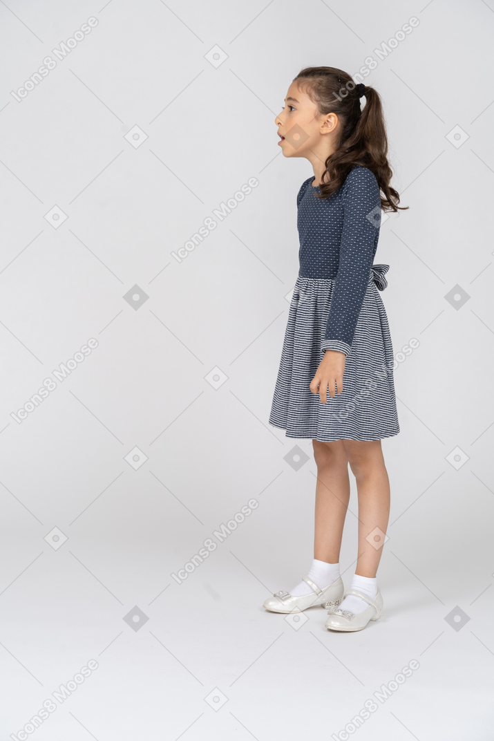 Side view of a girl looking tense and on edge