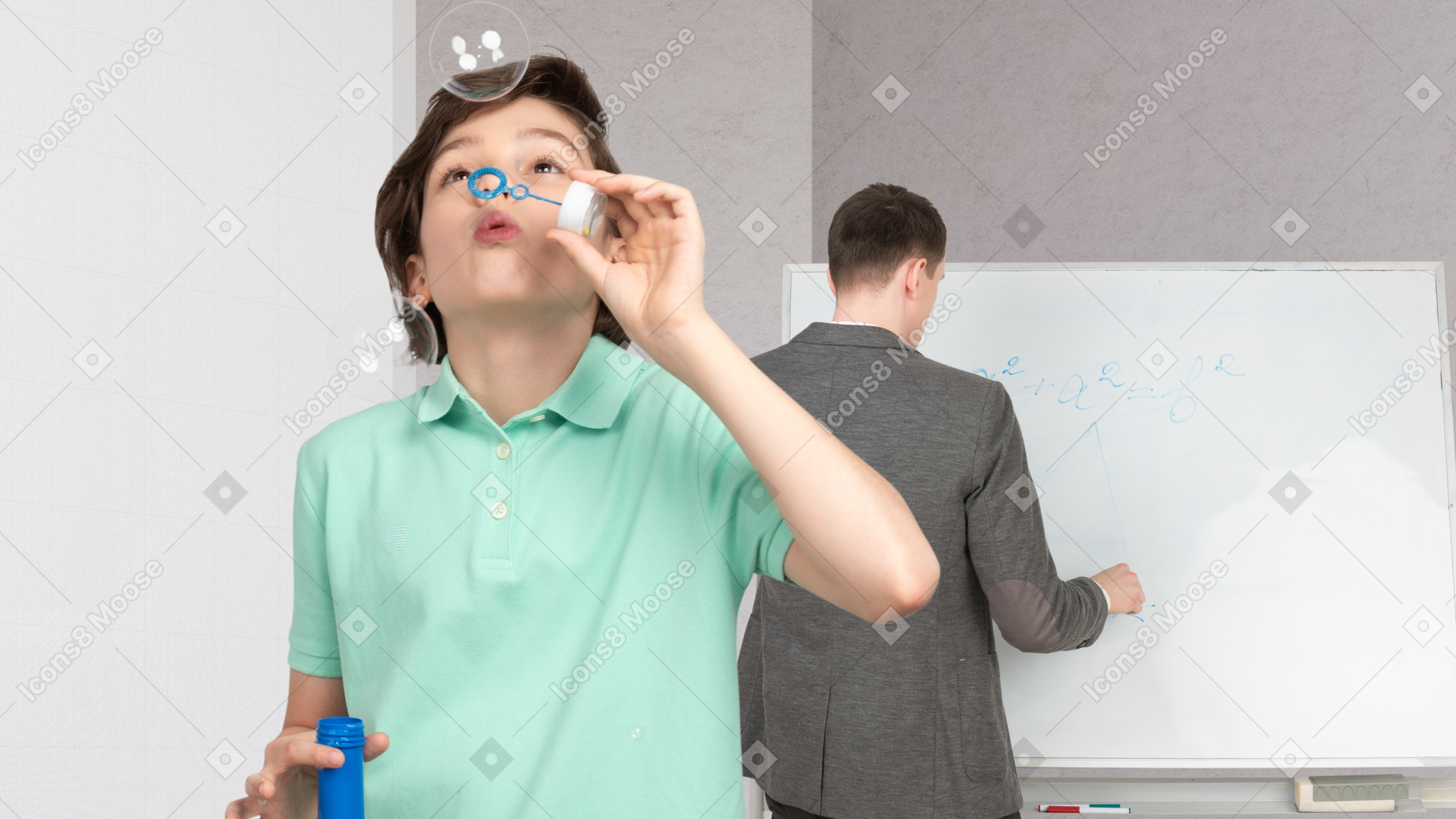 A boy blowing bubbles in front of a whiteboard