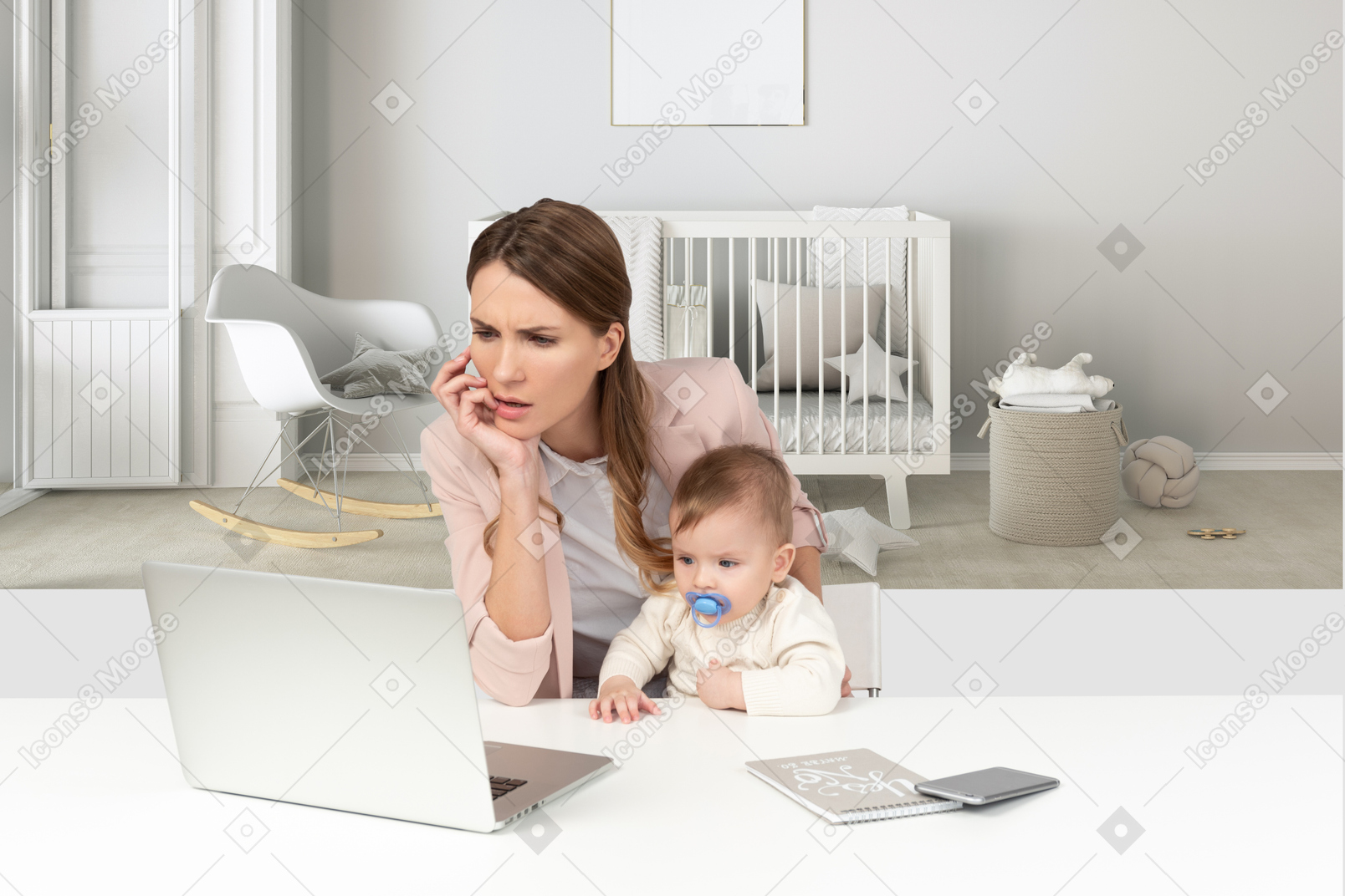 A beautiful frowned woman sitting by the office table with a baby boy and looking to laptop