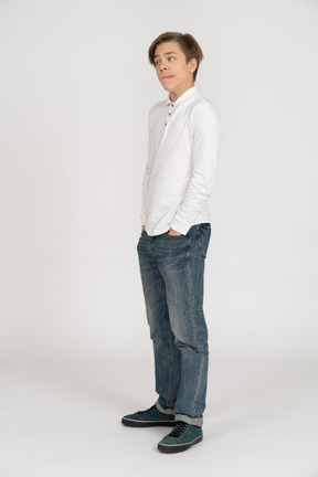 Young man in casual clothes standing