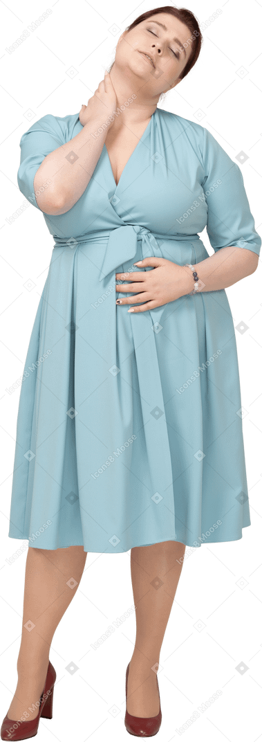 Front view of a woman in blue dress suffering from pain in neck