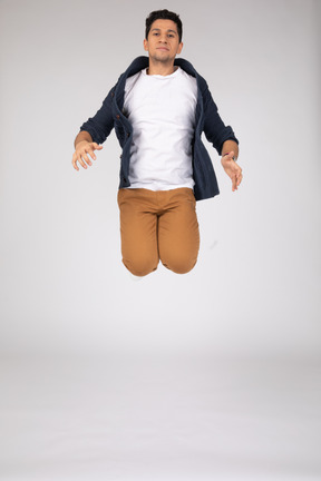 Man in casual clothes jumping