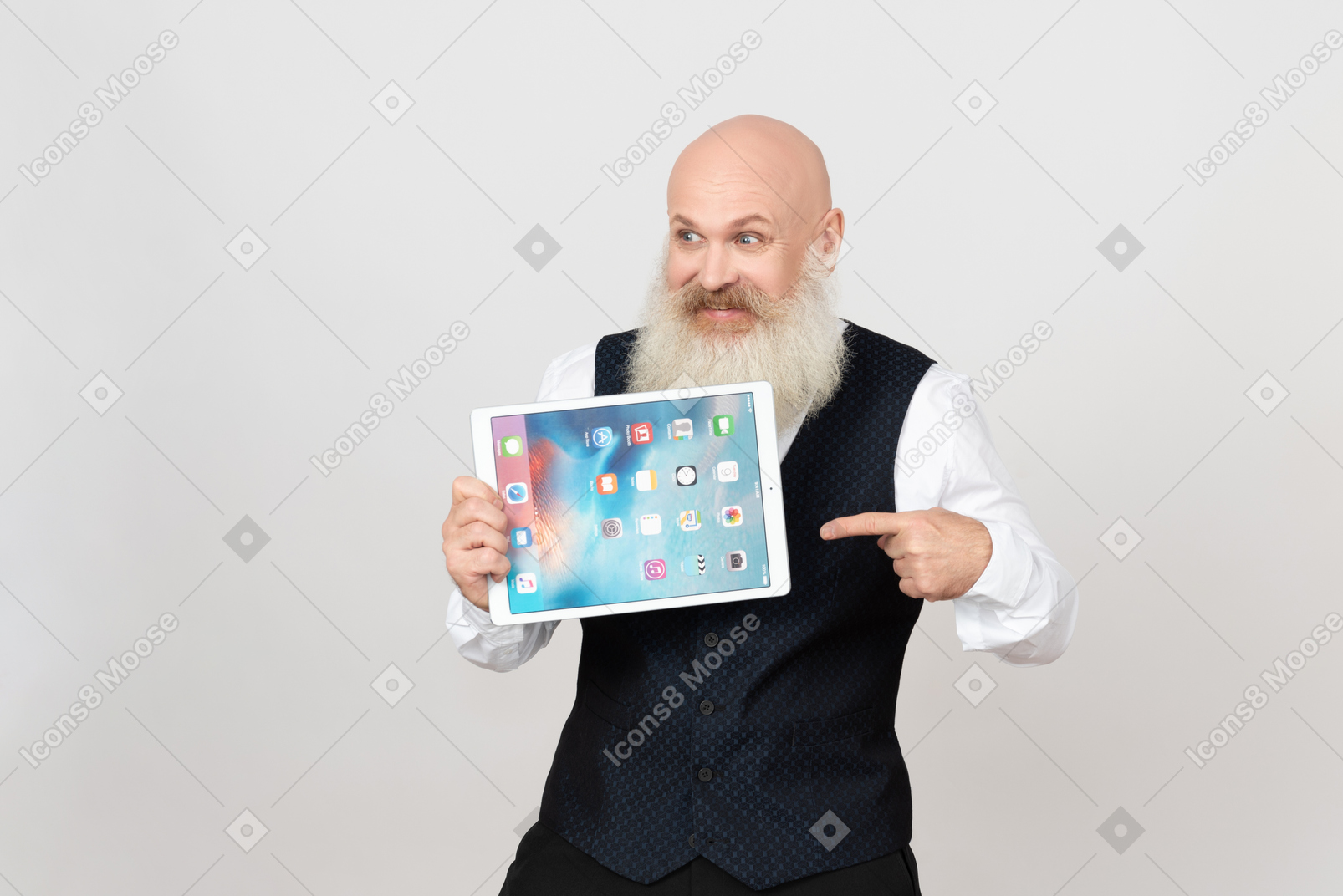 Excited aged man holding ipad and pointing on it