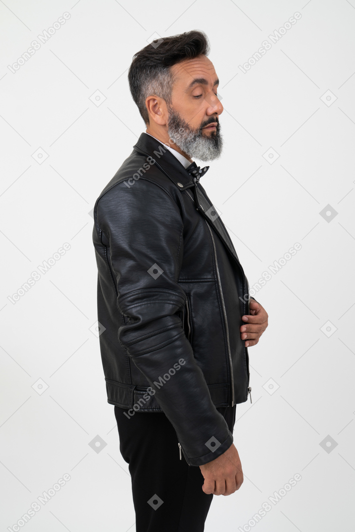 Handsome mature man standing in profile