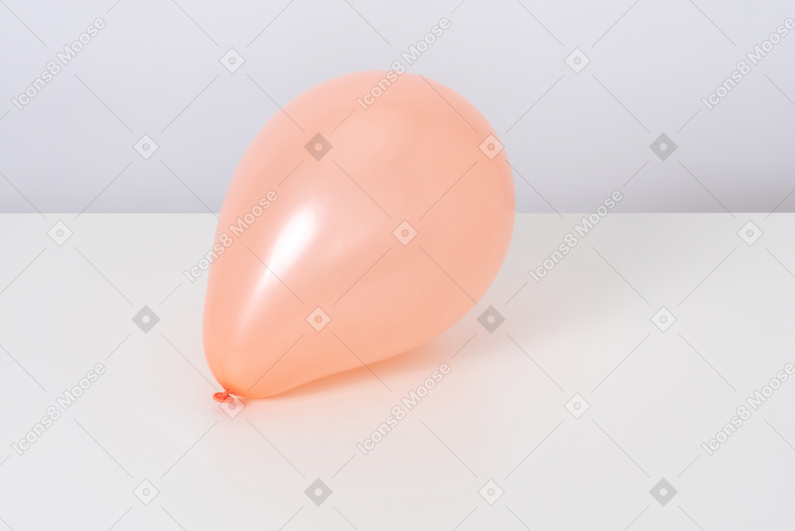 Orange balloon on a white background